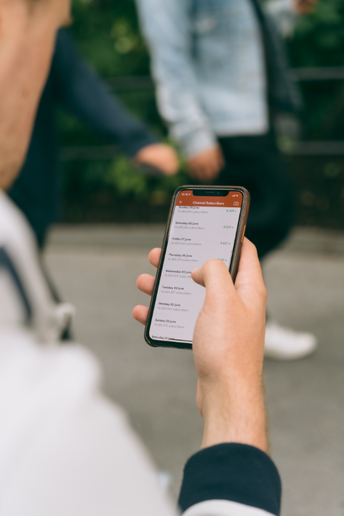 A hand holding a smartphone. Credit: CardMapr.nl, via Unsplash.